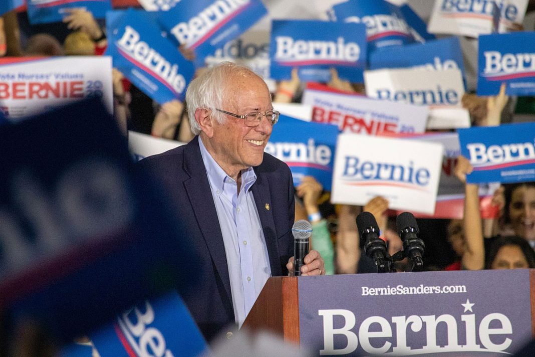 U.S. Senator en:Bernie Sanders smiling at a campaign rally on 1 March 2020.